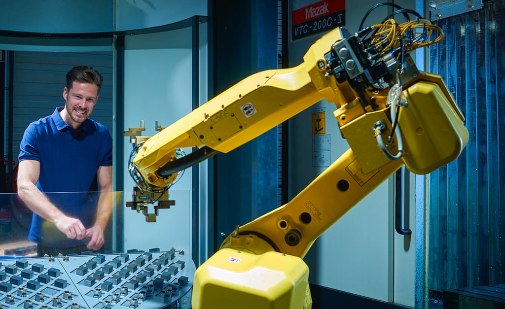 Nakamura Tome with Halter LoadAssistant loading robot cnc automation