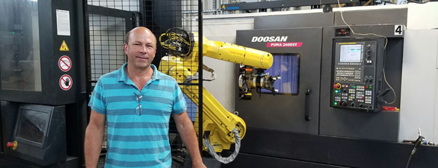 Vier HALTER LoadAssistants für automatische Beladung von Doosan CNC-Maschinen